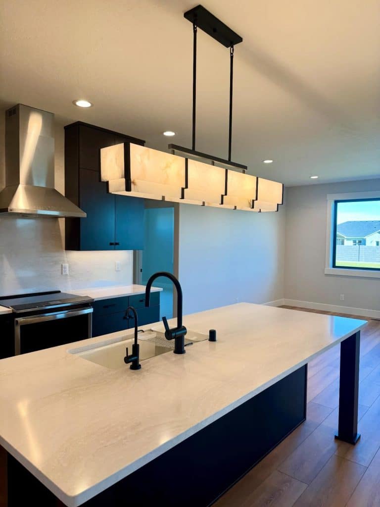 Kitchen Island Lighting Ideas That Turn Your Counter Into The Best Seat In The House